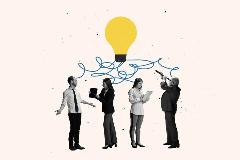 Team collaborating with creative ideas represented by a bright lightbulb and connecting lines